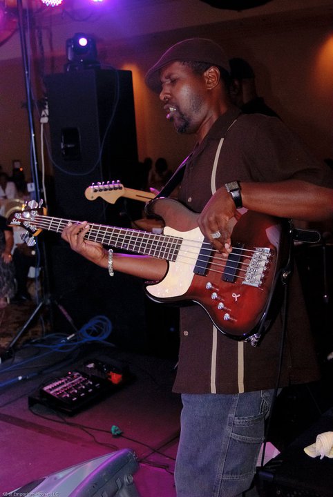 Bass guitarist performing live